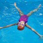 back floating in water